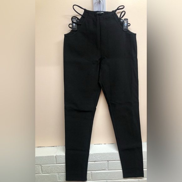 Black pants with hip cutouts - Picture 1 of 4